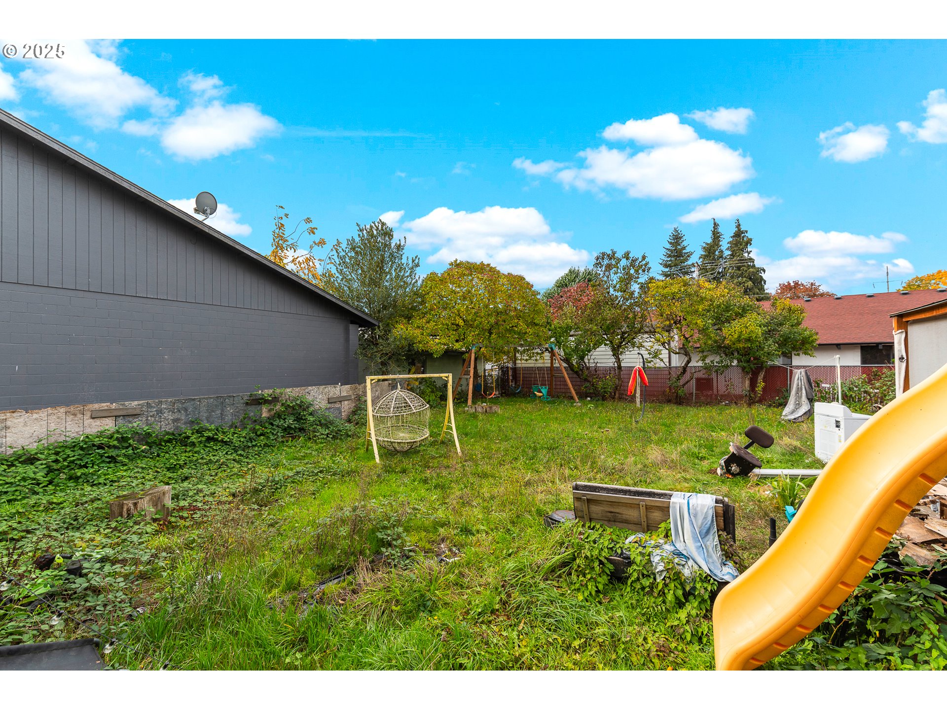 2026 C Street Washougal, WA 98671 - Photo 18 of 36 a backyard of a house with lots of green space