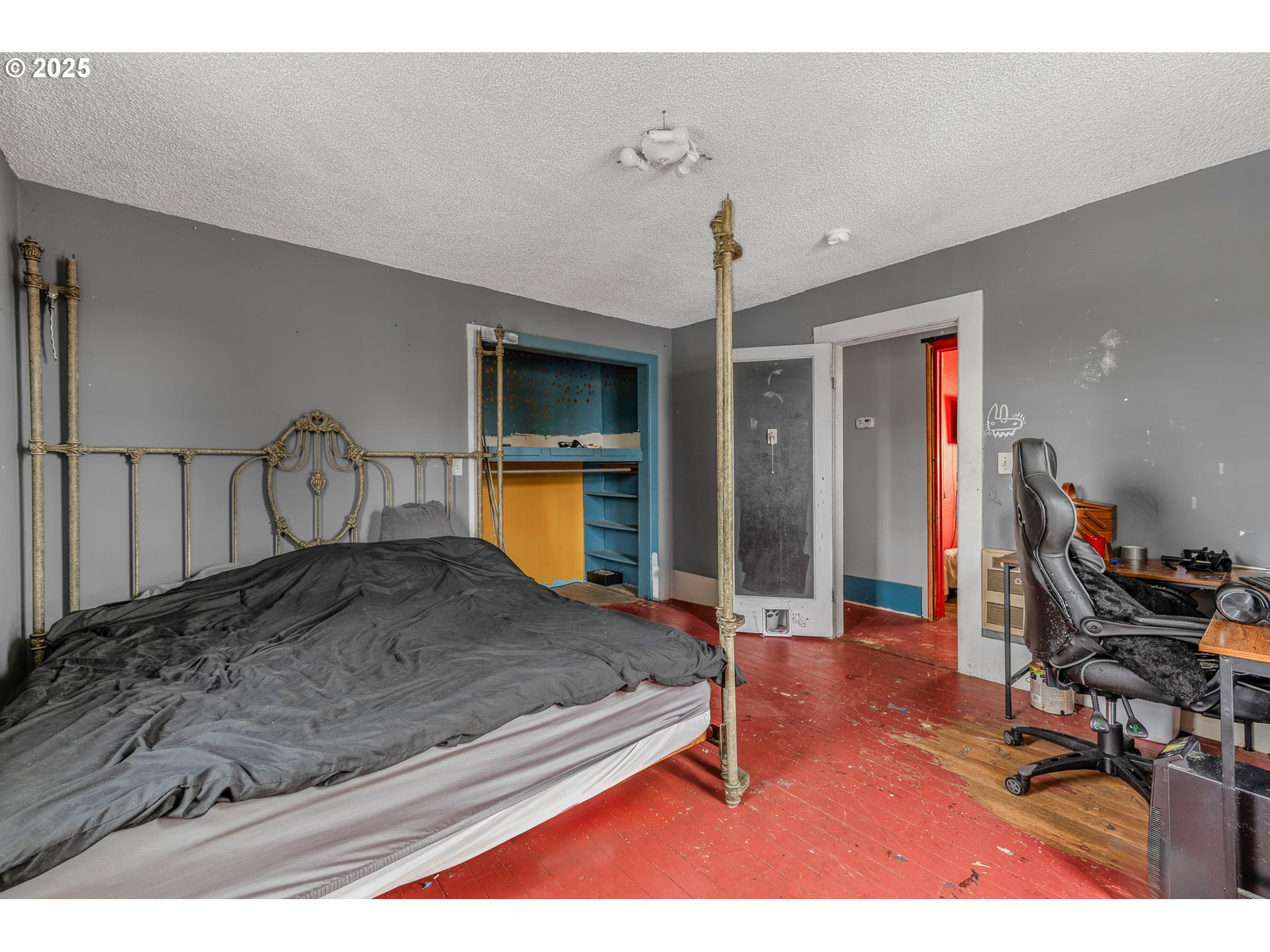 2026 C Street Washougal, WA 98671 - Photo 21 of 36 a bedroom with a bed window and chair