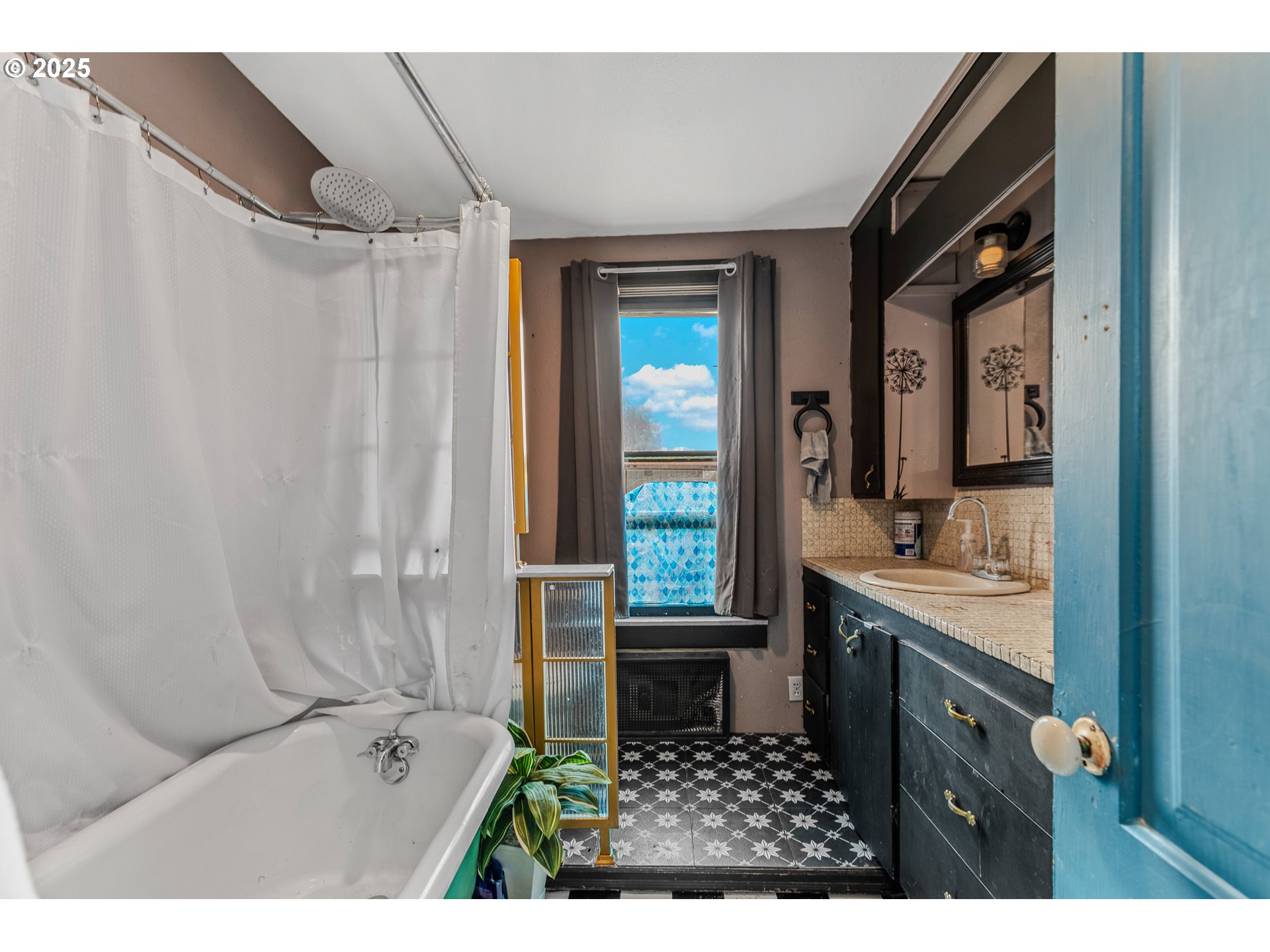 2026 C Street Washougal, WA 98671 - Photo 23 of 36 a bathroom with a sink and a mirror