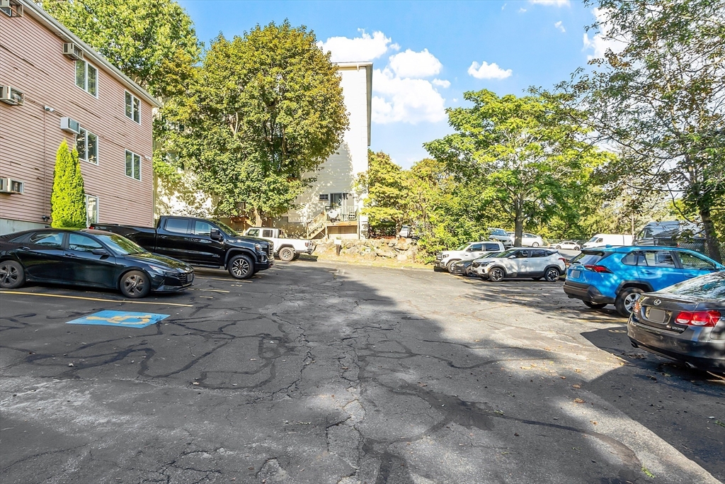 10 Dryden Street, Unit 7 Worcester, MA 01605 - Photo 24 of 24 a car parked in front of a building