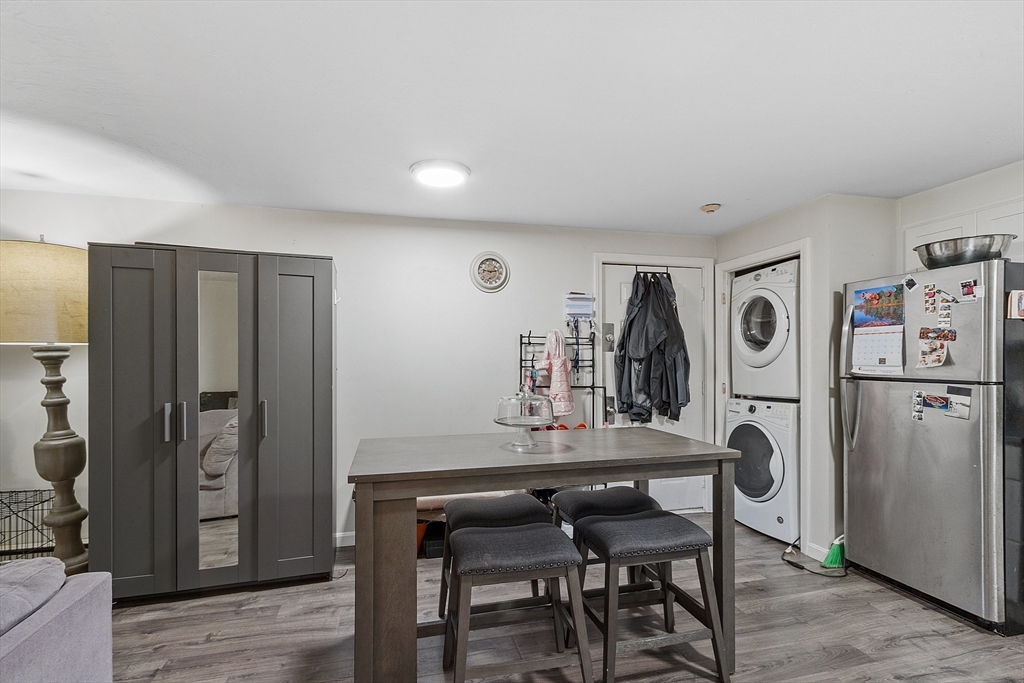 10 Dryden Street, Unit 7 Worcester, MA 01605 - Photo 4 of 24 a view of a dining room with furniture and window
