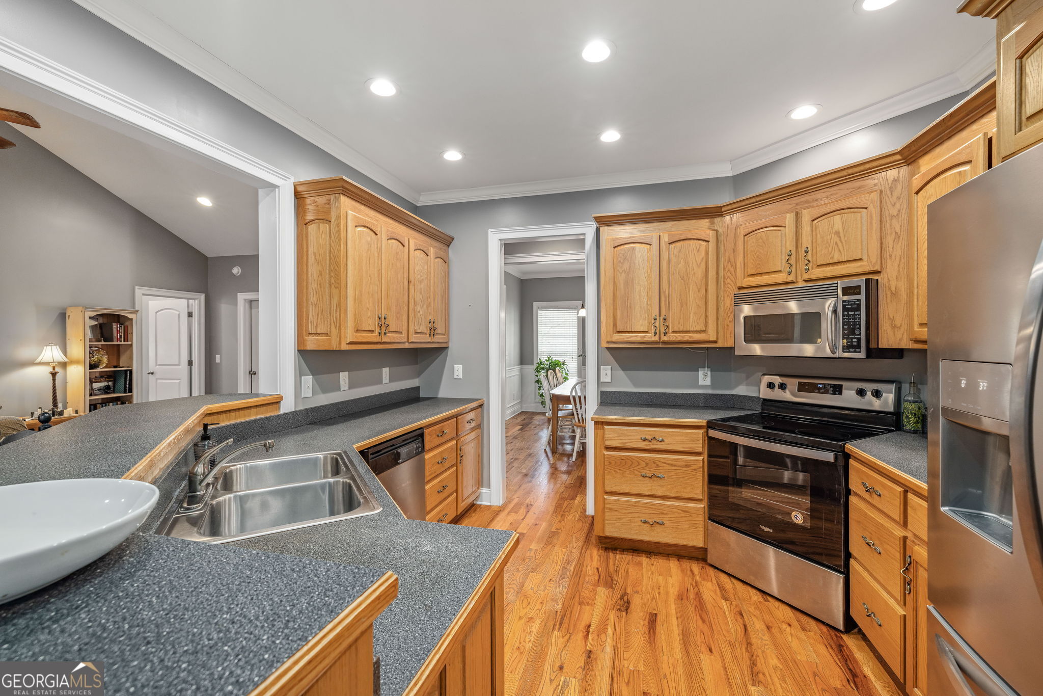 274 Hopes Circle Demorest, GA 30535 - Photo 11 of 53 a kitchen with wooden cabinets and stainless steel appliances