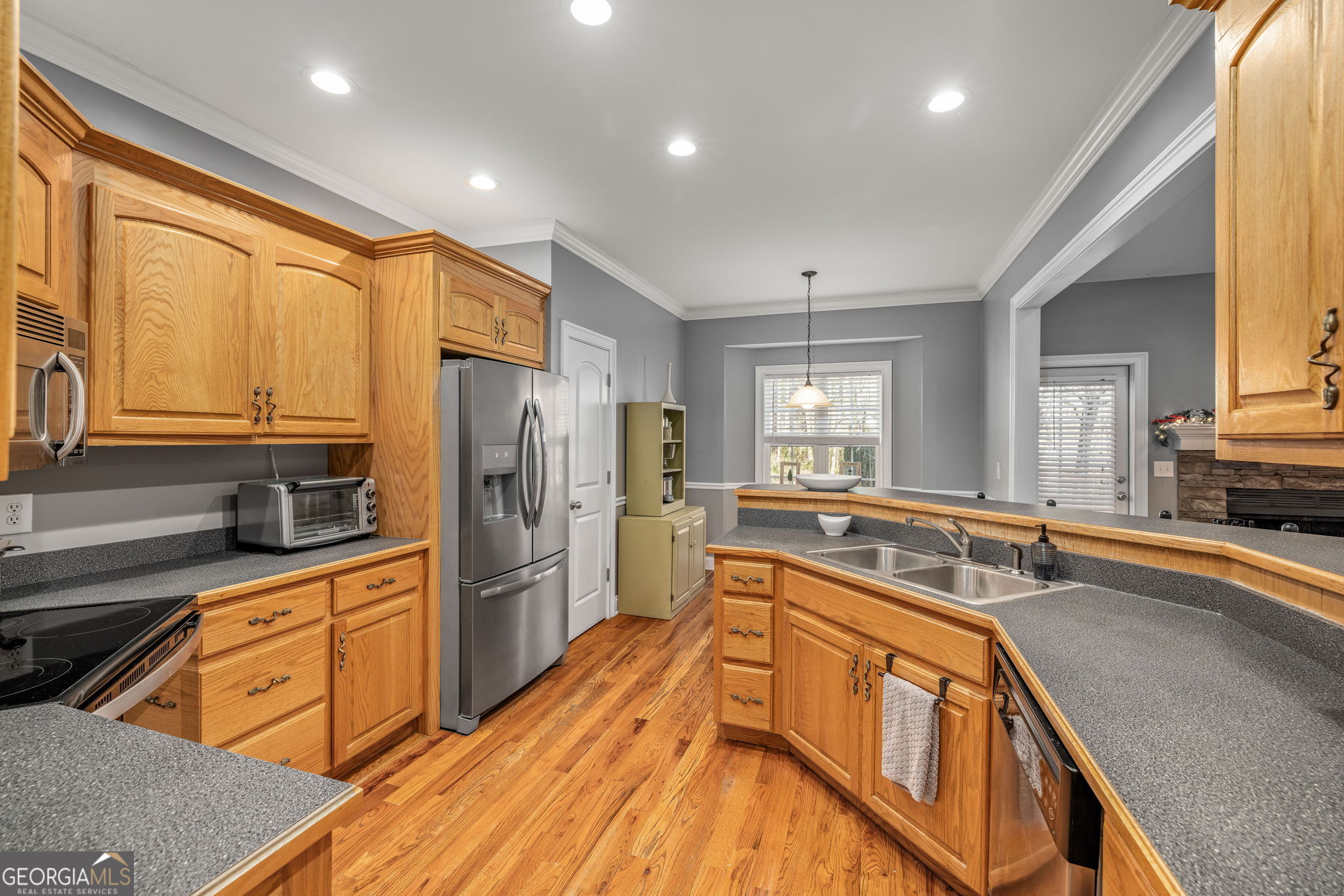 274 Hopes Circle Demorest, GA 30535 - Photo 12 of 53 a kitchen with stainless steel appliances granite countertop a sink stove and refrigerator