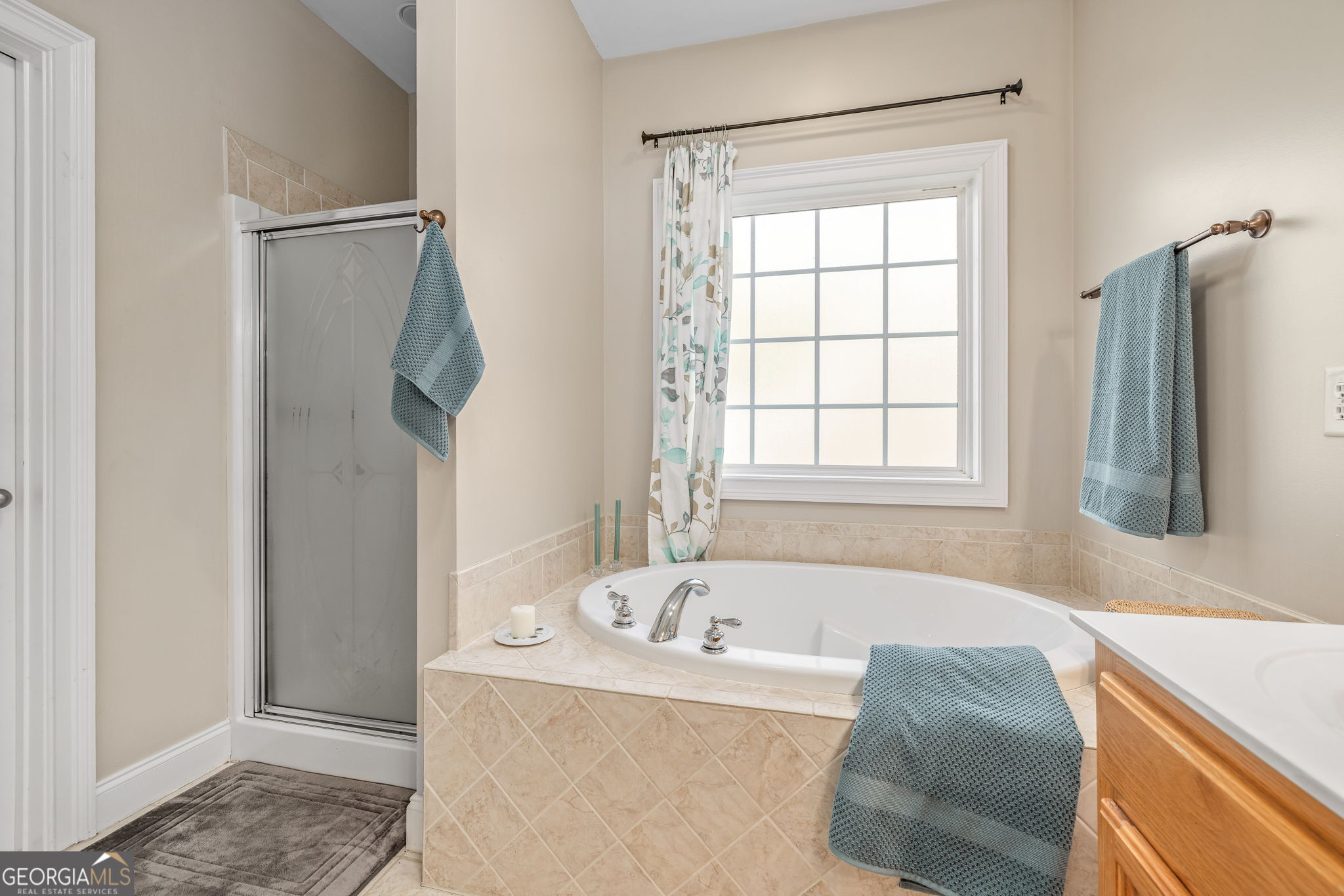 274 Hopes Circle Demorest, GA 30535 - Photo 19 of 53 a bathroom with a tub and a window
