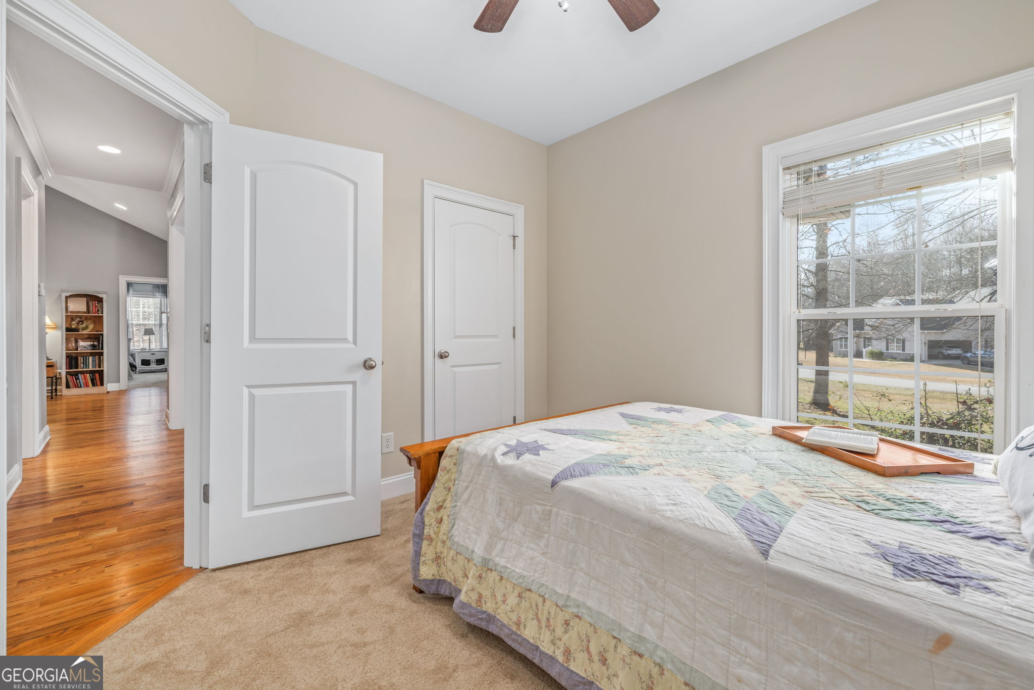 274 Hopes Circle Demorest, GA 30535 - Photo 22 of 53 a bedroom with a bed and wooden floor