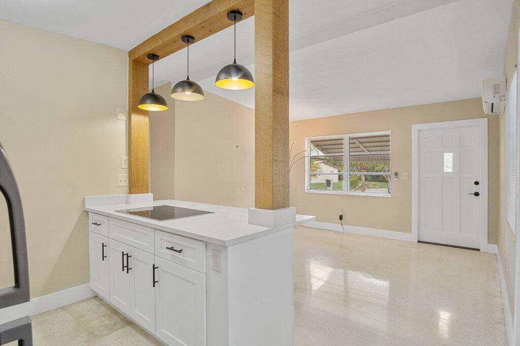591 Oleander Road Lake Worth, FL 33462 - Photo 12 of 43 a bathroom with a granite countertop sink and a mirror