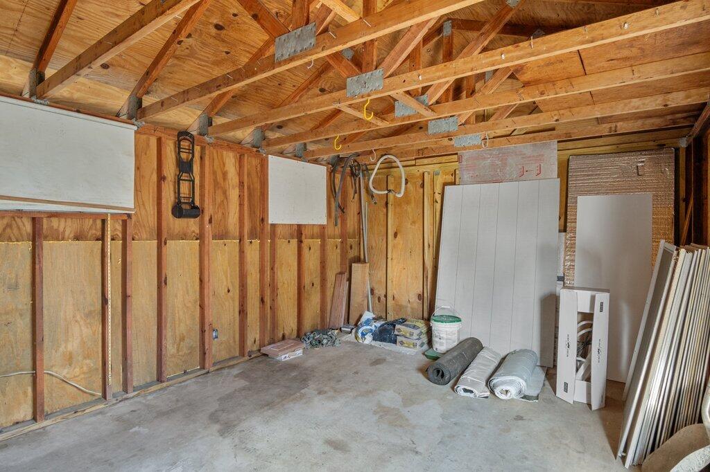 591 Oleander Road Lake Worth, FL 33462 - Photo 31 of 43 a view of a room with wooden walls