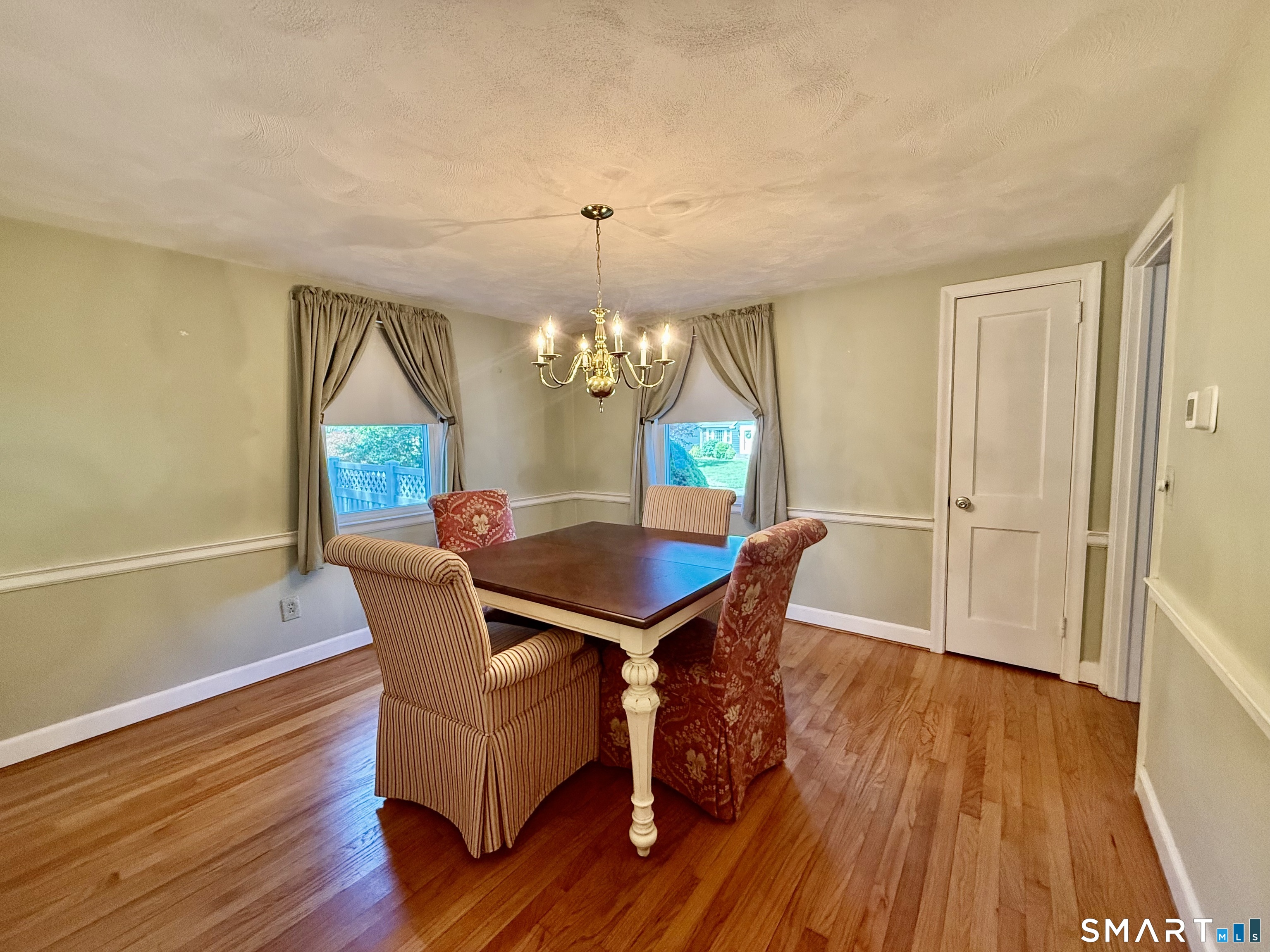 22 Cavan Road East Hartford, CT 06118 - Photo 9 of 22 Gorgeous hardwood floors in dining room