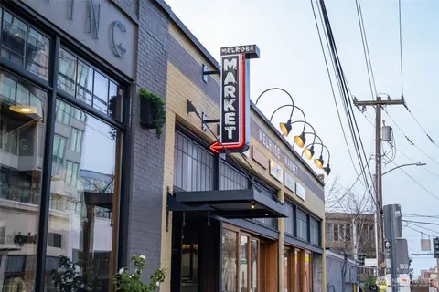 a view of street with sitting area
