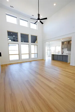 a kitchen with a sink and a refrigerator