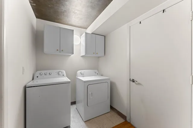 a view of an empty room with a closet