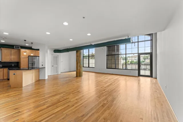 a view of a building with a yard