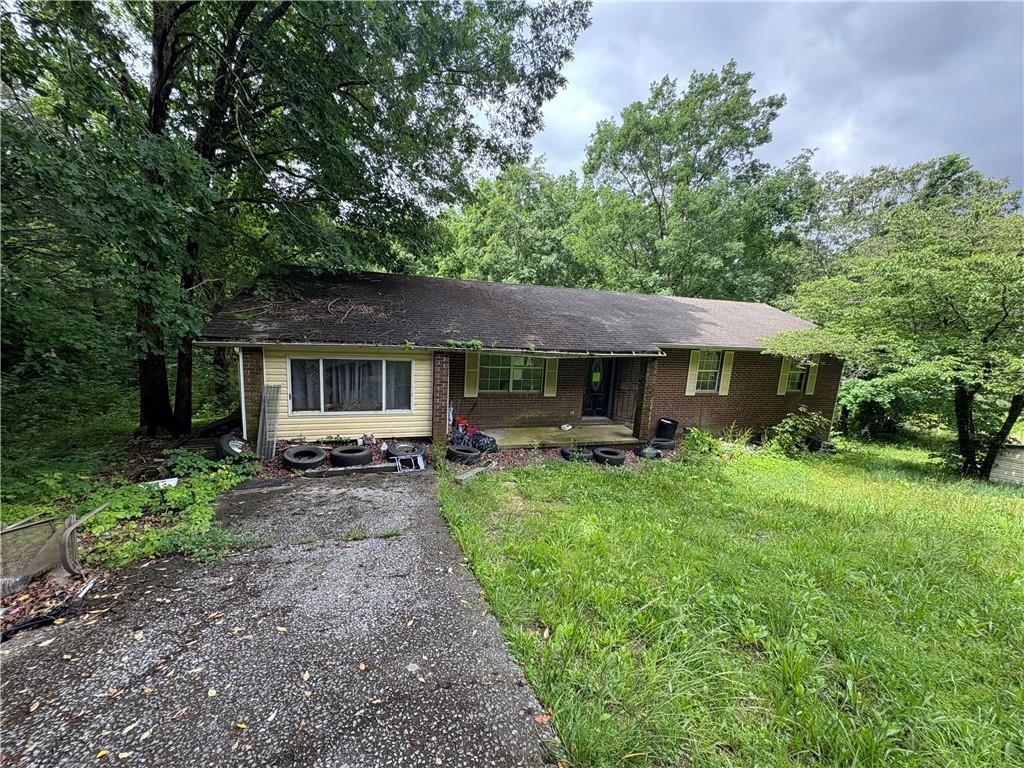 643 Akins Road Chickamauga, GA 30707 - Photo 1 of 1 a front view of a house with yard patio and green space