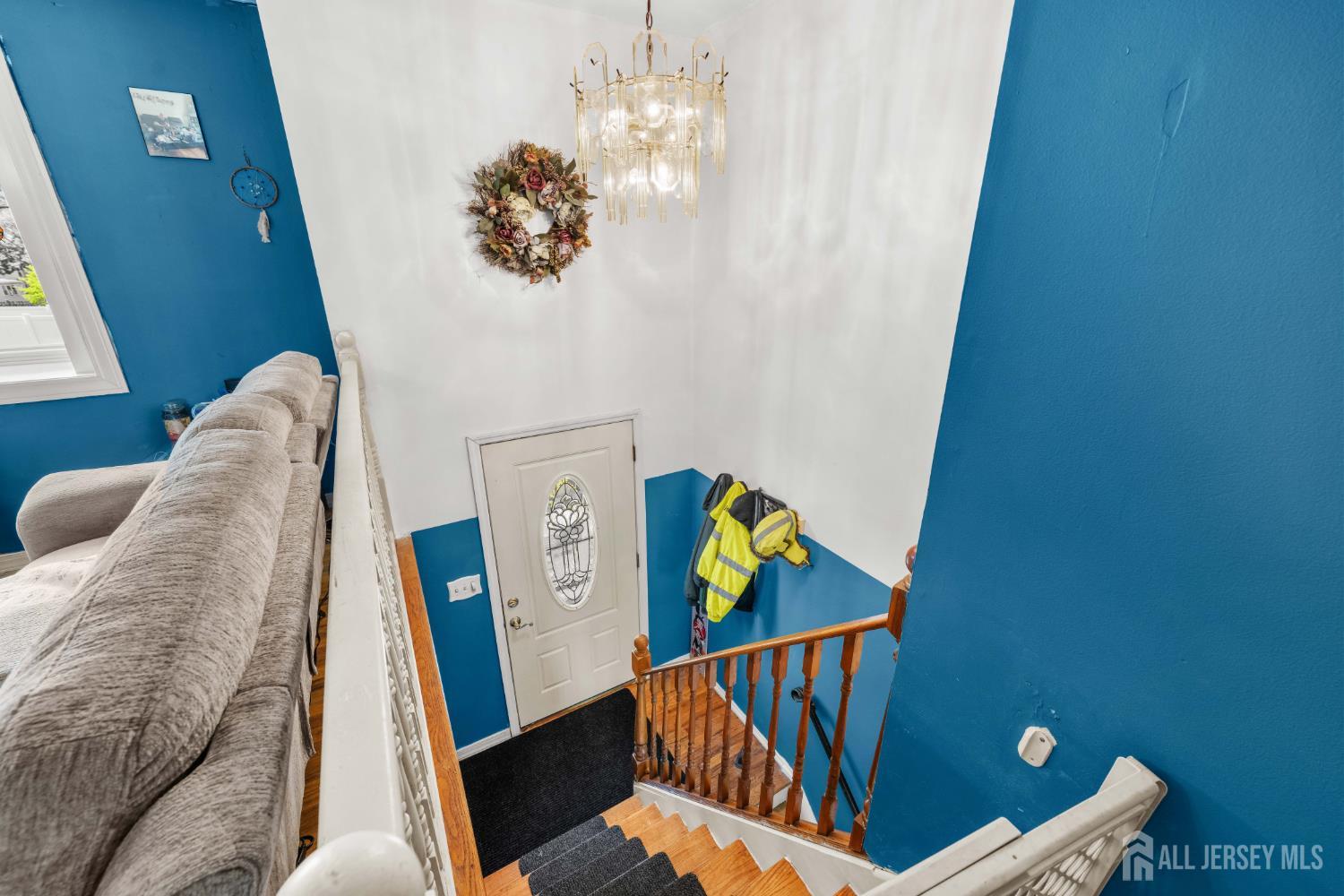 245 4th Street Dunellen, NJ 08812 - Photo 2 of 27 a view of a bedroom with furniture and book shelf