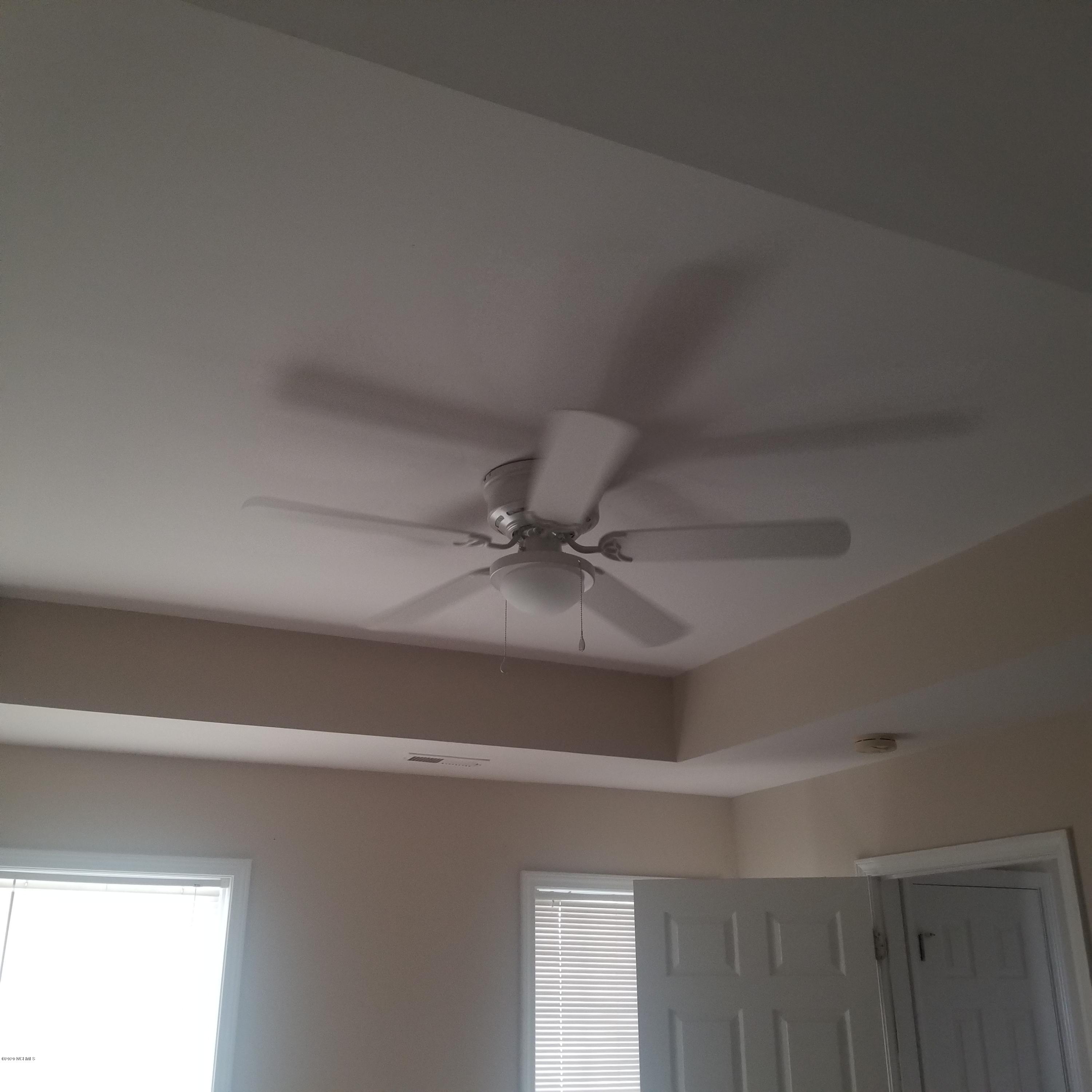 2210 Mayberry Loop Road, Unit B Morehead City, NC 28557 - Photo 12 of 16 tray ceiling in principle bedroom