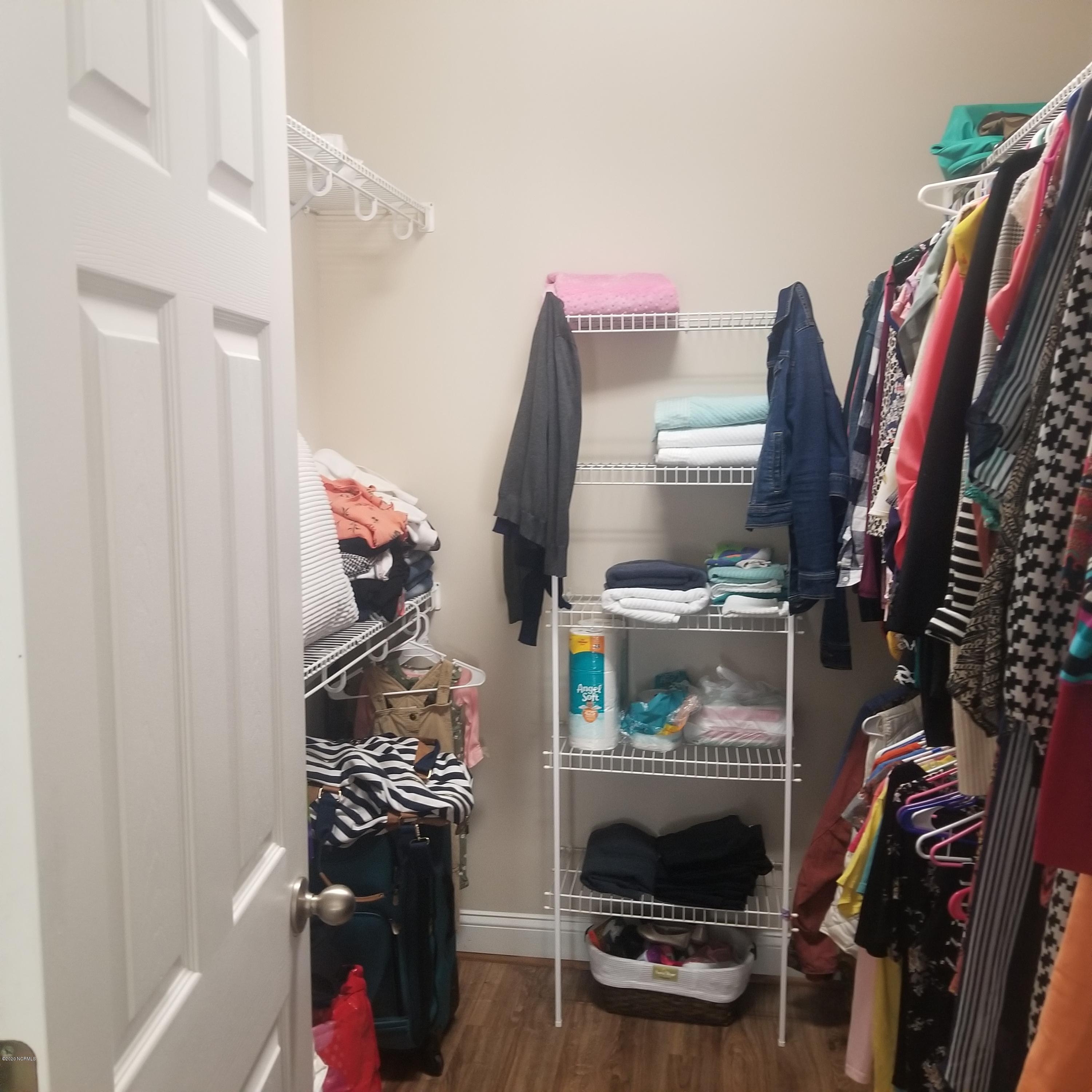 2210 Mayberry Loop Road, Unit B Morehead City, NC 28557 - Photo 10 of 16 walk in closet with light