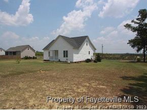 3605 Old Stage Road North Angier, NC 27501 - Photo 12 of 12 a view of a house with a yard