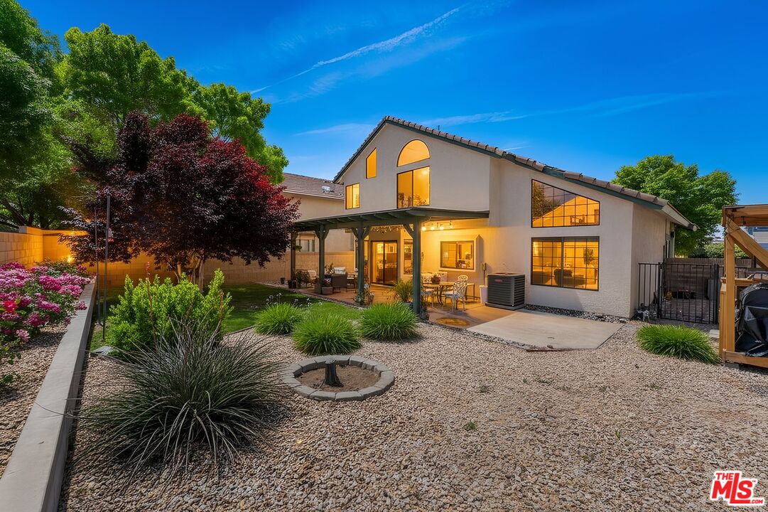 43258 33rd Street West Lancaster, CA 93536 - Photo 2 of 38 a view of a house with a yard