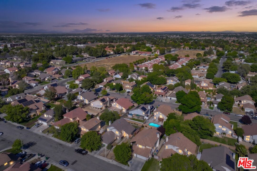 43258 33rd Street West Lancaster, CA 93536 - Photo 34 of 38 an aerial view of residential houses with outdoor space