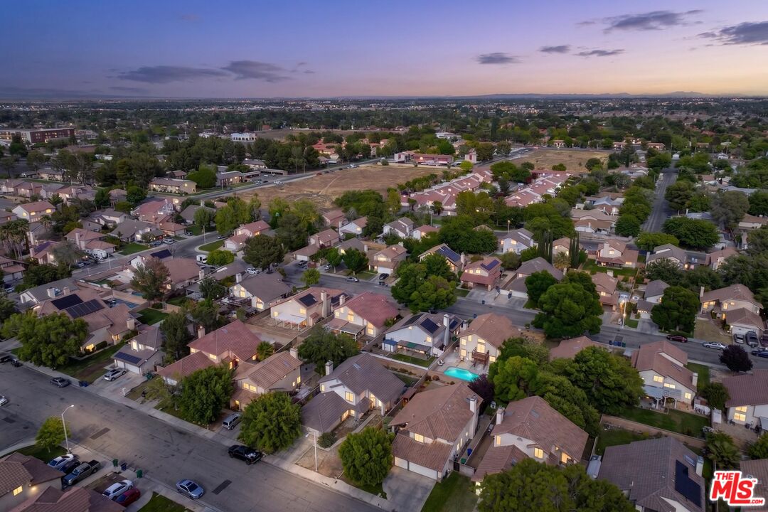 43258 33rd Street West Lancaster, CA 93536 - Photo 36 of 38 an aerial view of residential houses with outdoor space