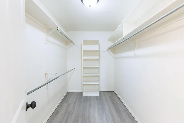 a view of an empty walk in closet