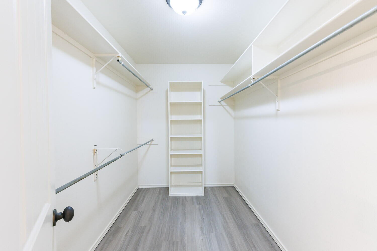 5908 95th Street Lubbock, TX 79424 - Photo 32 of 45 a view of an empty walk in closet