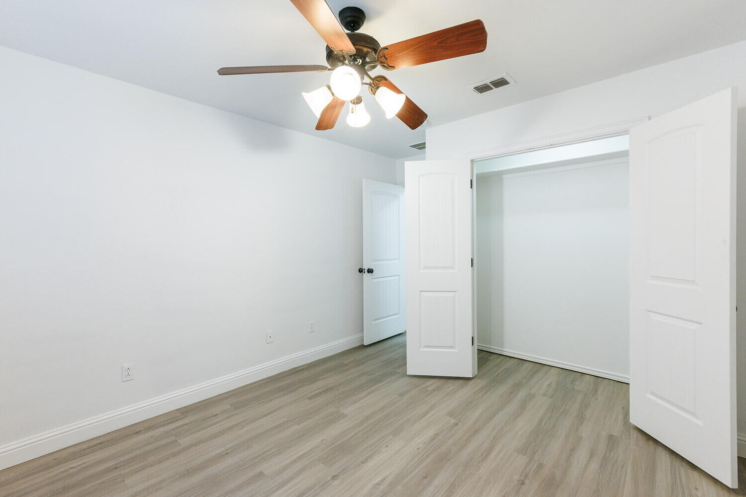 5908 95th Street Lubbock, TX 79424 - Photo 42 of 45 wooden floor in an empty room