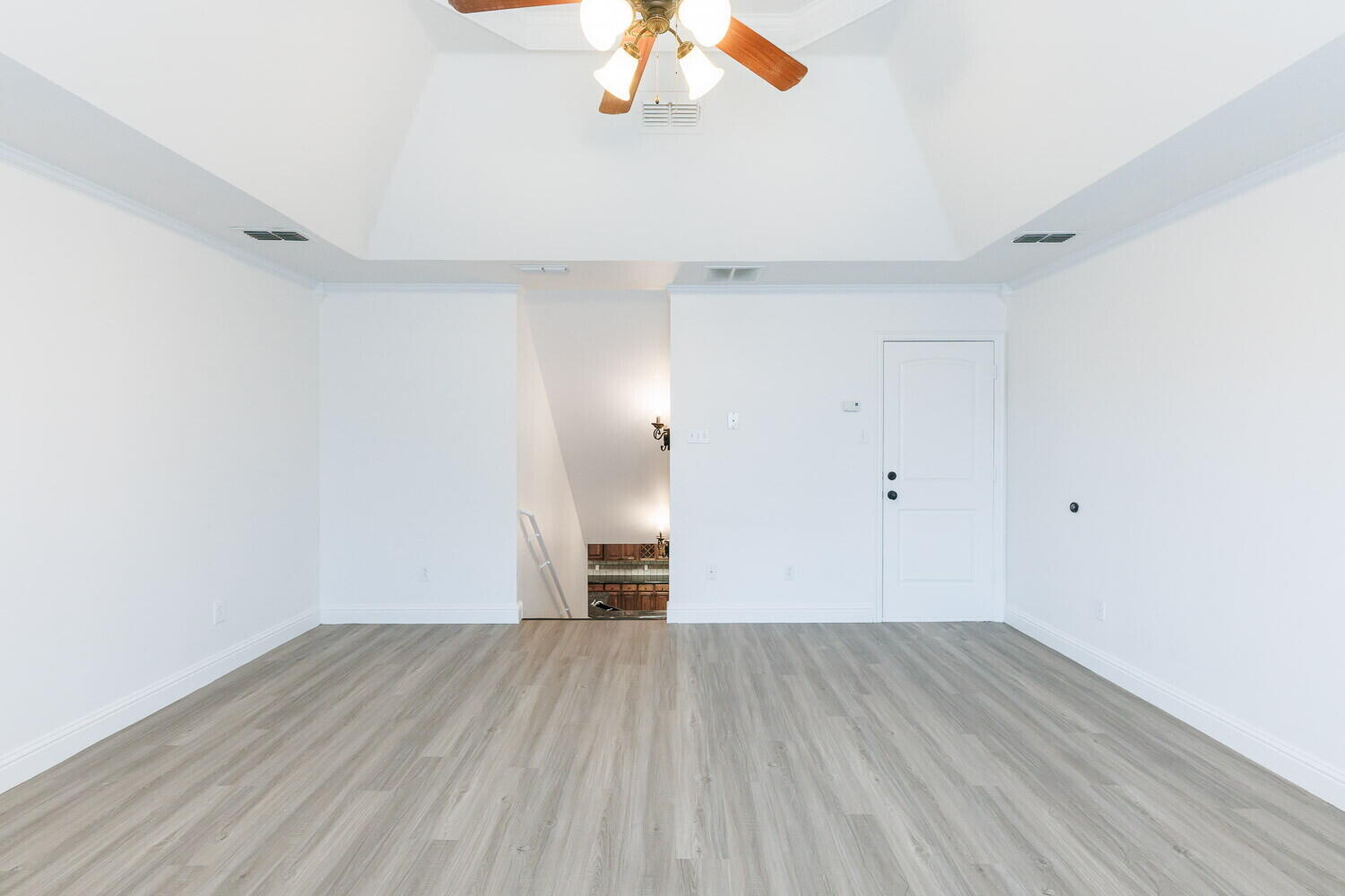 5908 95th Street Lubbock, TX 79424 - Photo 7 of 45 a view of empty room with wooden floor