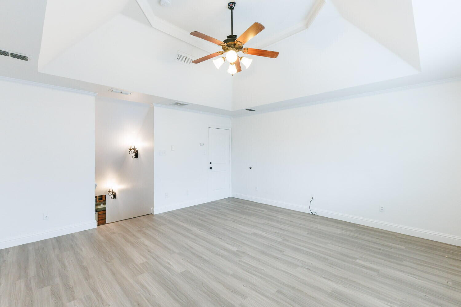 5908 95th Street Lubbock, TX 79424 - Photo 8 of 45 wooden floor in an empty room with a window