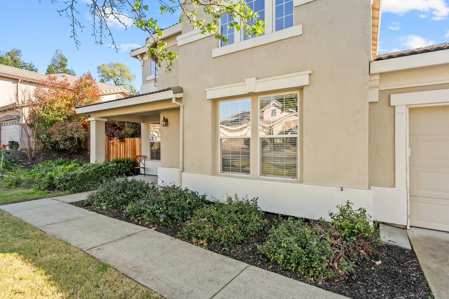 4285 Crazy Horse Road Cameron Park, CA 95682 - Photo 13 of 91 front view of a house with a yard