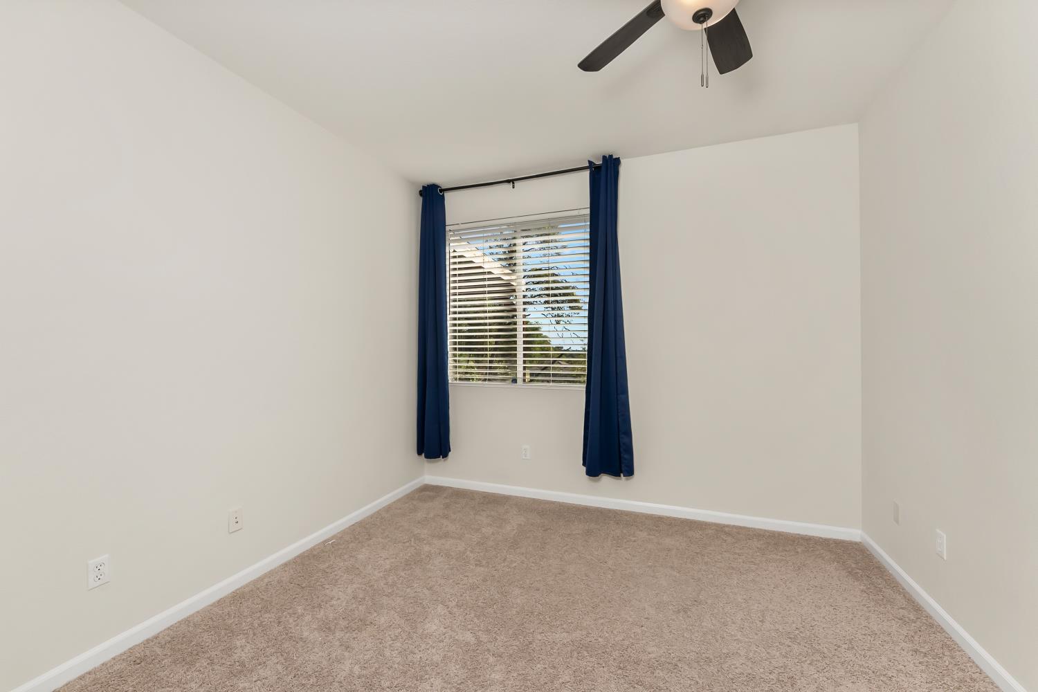 4285 Crazy Horse Road Cameron Park, CA 95682 - Photo 43 of 91 an empty room with a empty space and windows