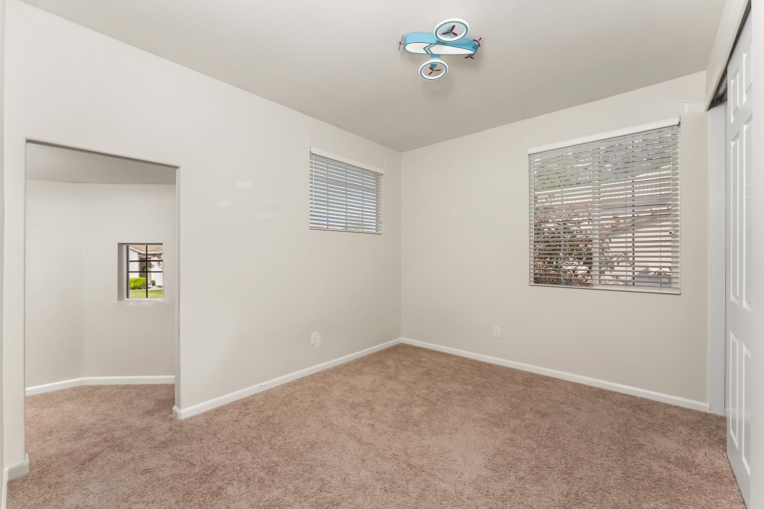 4285 Crazy Horse Road Cameron Park, CA 95682 - Photo 51 of 91 an empty room with windows