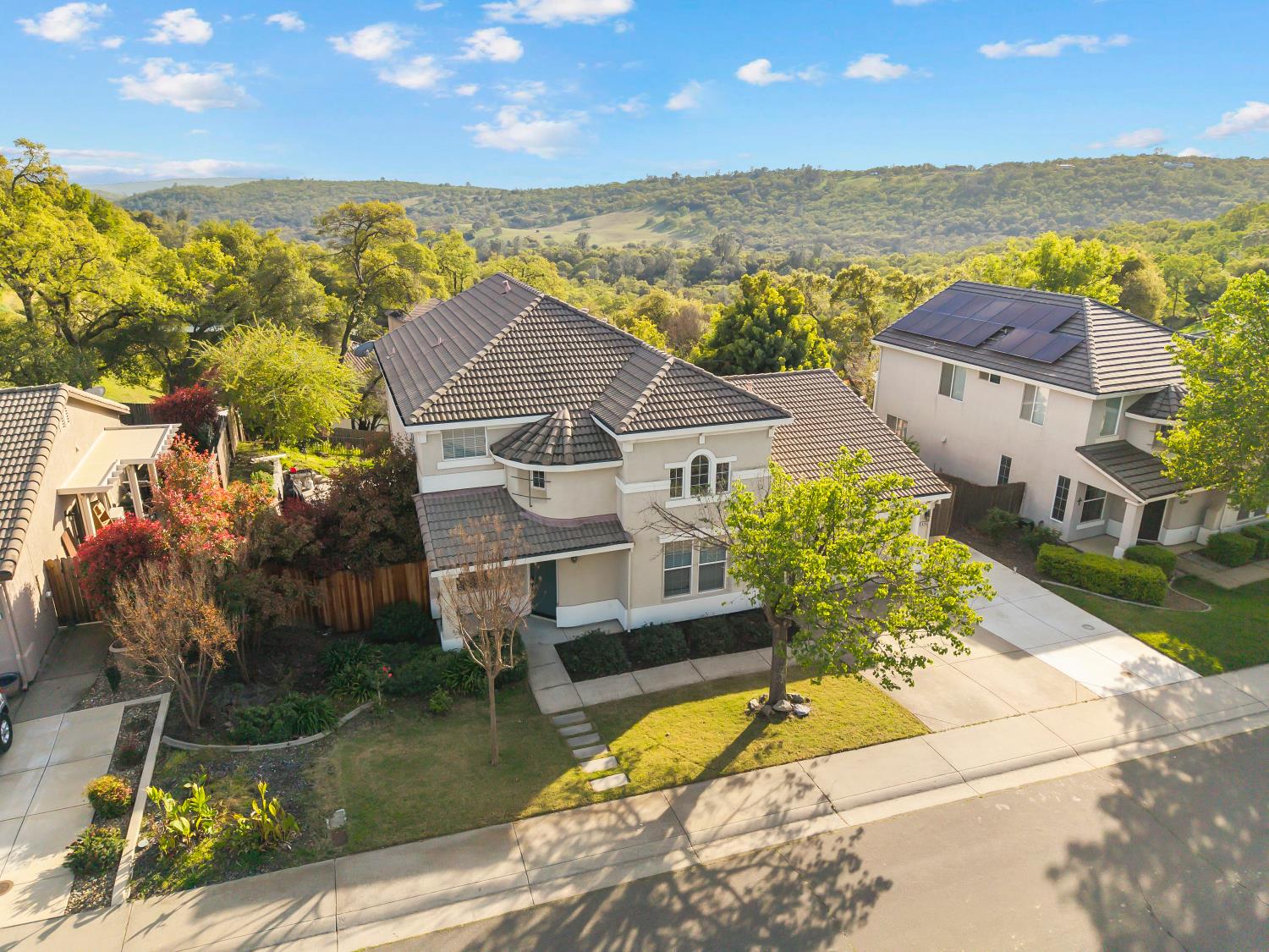 4285 Crazy Horse Road Cameron Park, CA 95682 - Photo 6 of 91 an aerial view of a house with a ocean view