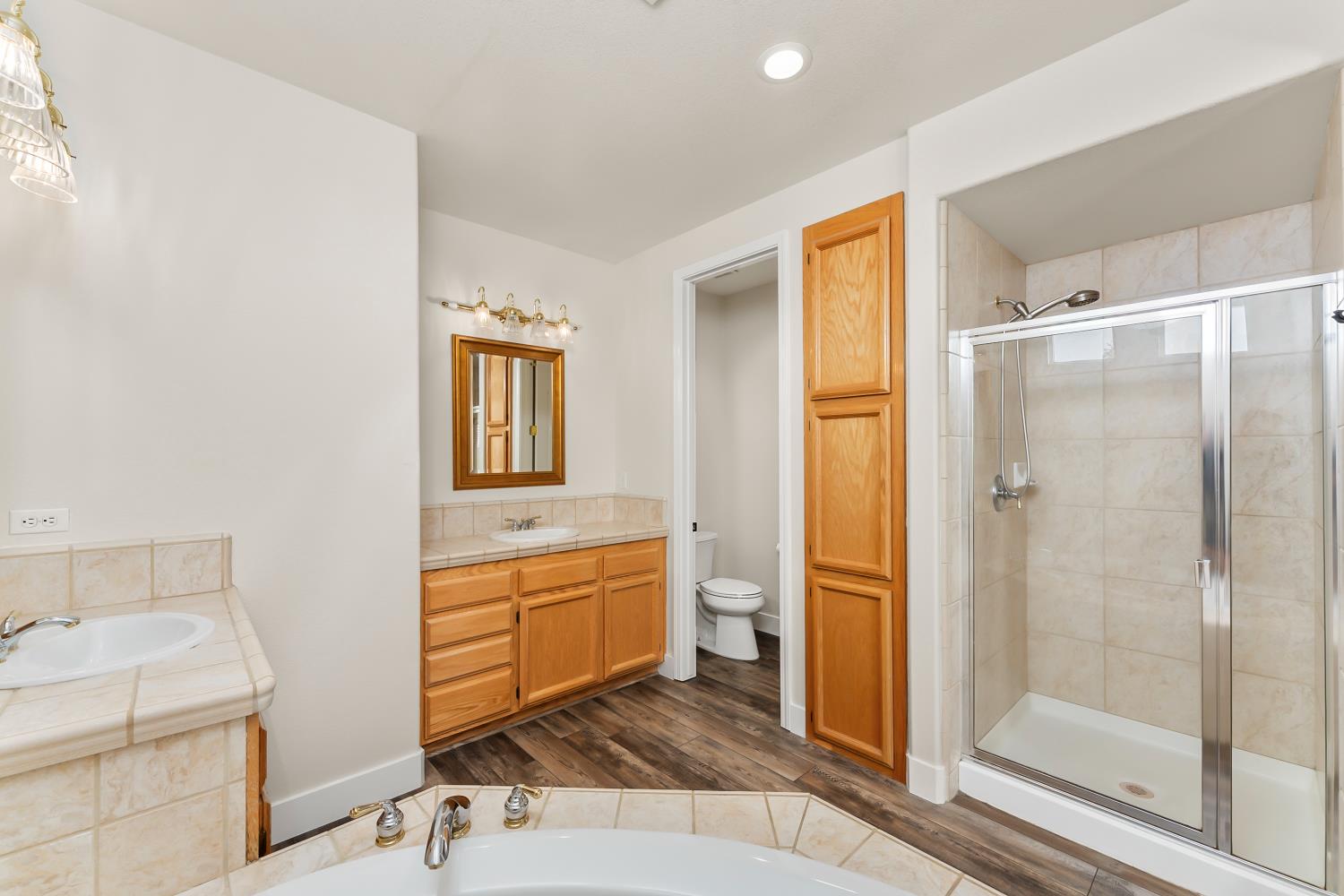 4285 Crazy Horse Road Cameron Park, CA 95682 - Photo 65 of 91 a bathroom with a sink and a mirror