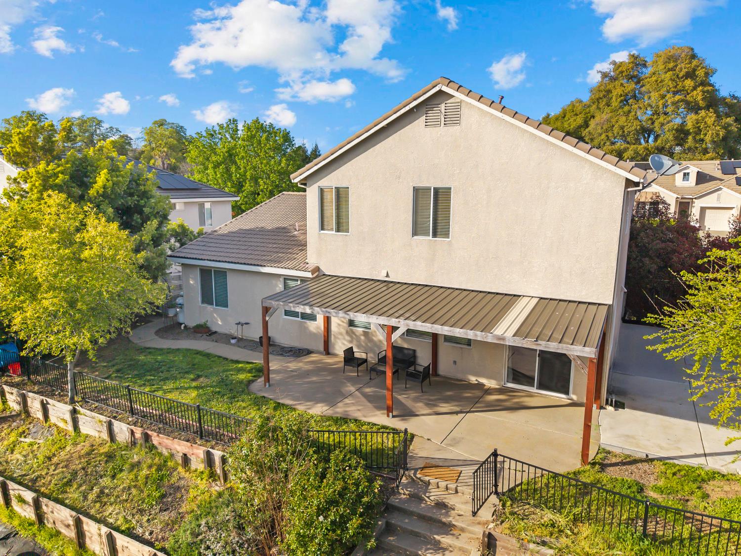 4285 Crazy Horse Road Cameron Park, CA 95682 - Photo 77 of 91 a view of house with backyard and sitting area