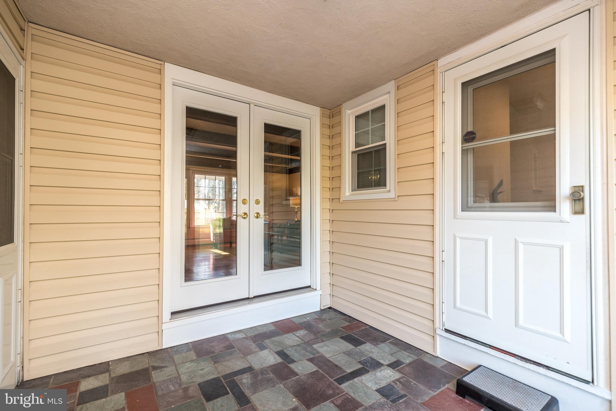 3187 April Lane Doylestown, PA 18902 - Photo 22 of 44 Breeze Way To Garage From Laundry & Family Rooms