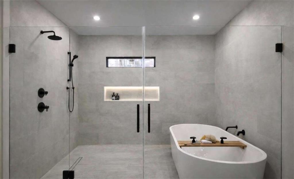 6275 Campbellton Road Southwest South Fulton, GA 30331 - Photo 9 of 9 a bathroom with a bathtub and shower