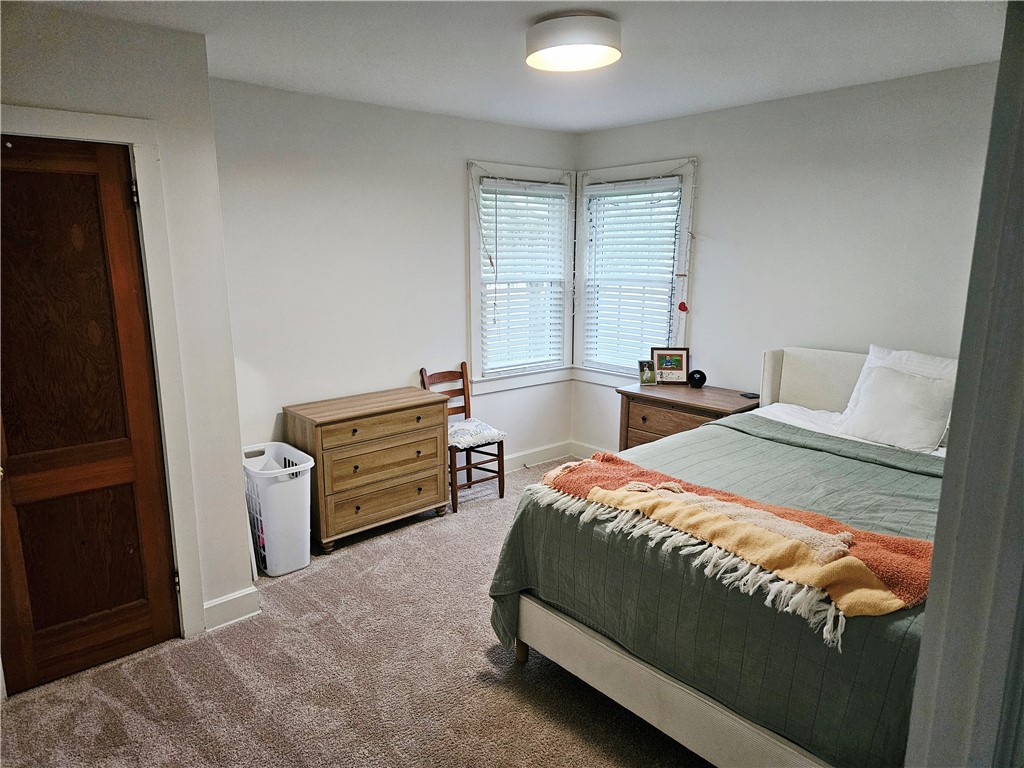 757 Belle Shoals Road Pickens, SC 29671 - Photo 16 of 31 A well-lit bedroom offering a cozy retreat with soft carpeting and natural light.