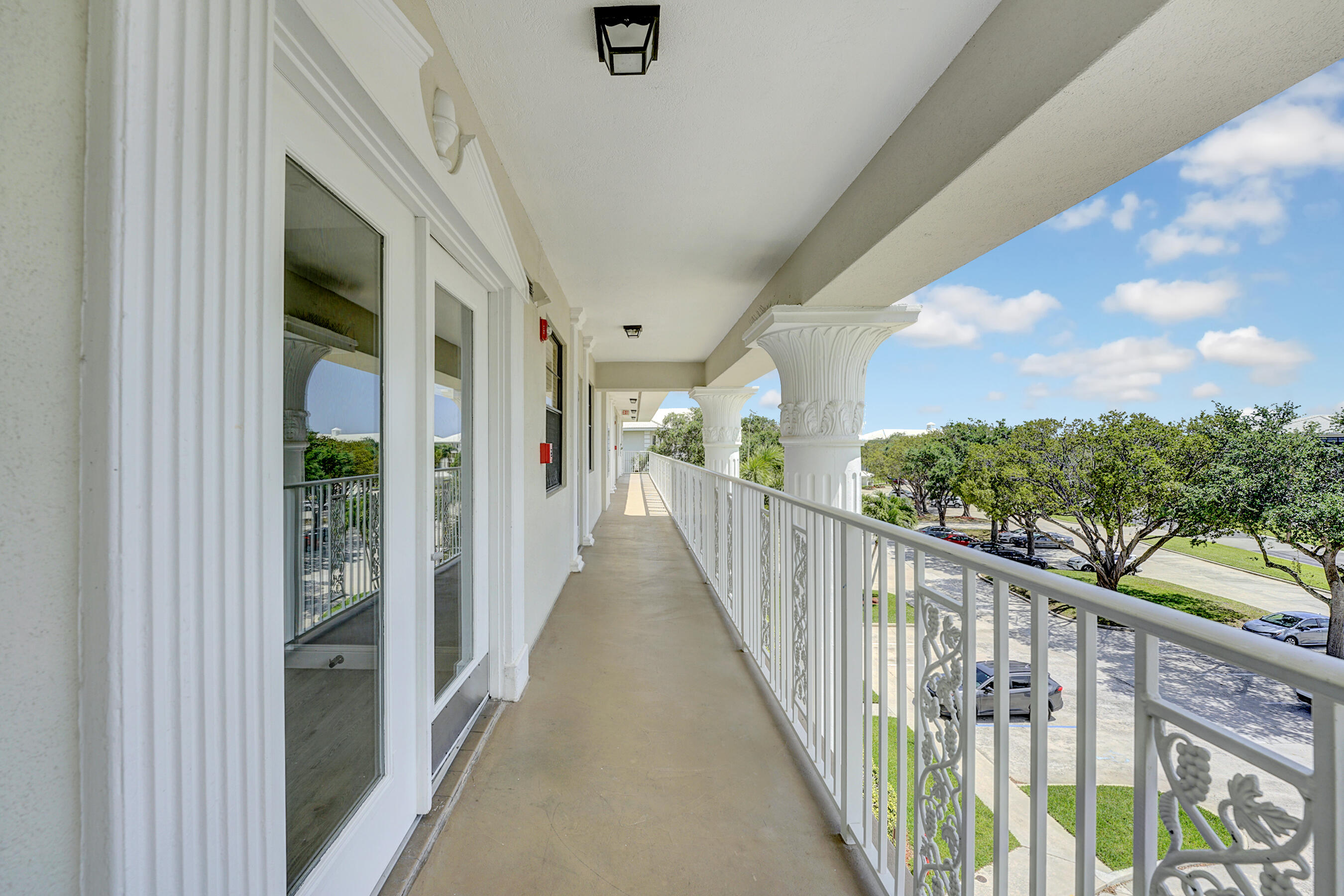 6097 Balboa Circle, Unit 406 Boca Raton, FL 33433 - Photo 1 of 28 a view of a balcony