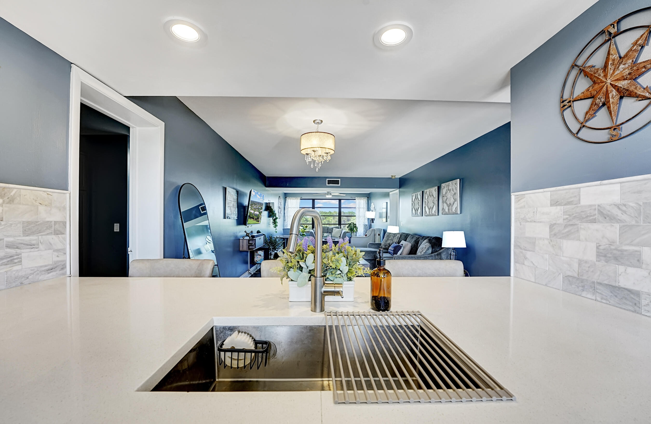 6097 Balboa Circle, Unit 406 Boca Raton, FL 33433 - Photo 13 of 28 a view of a living room and dining room