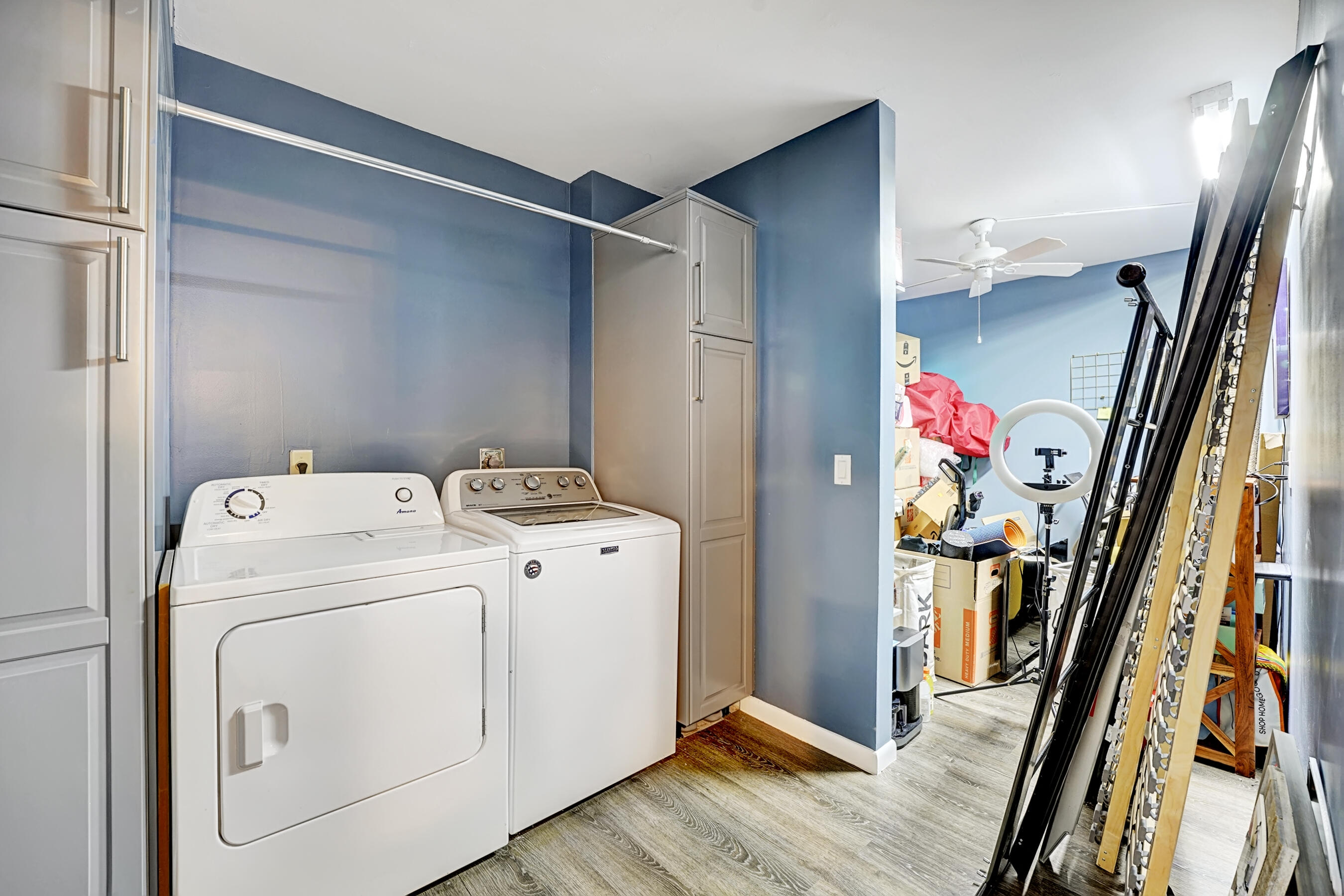 6097 Balboa Circle, Unit 406 Boca Raton, FL 33433 - Photo 14 of 28 a utility room with dryer and washer