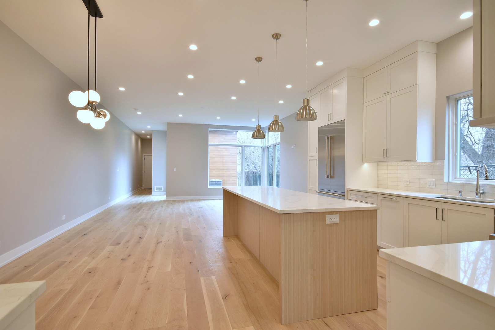 274 North Addison Avenue Elmhurst, IL 60126 - Photo 11 of 57 a large kitchen with kitchen island a island in it