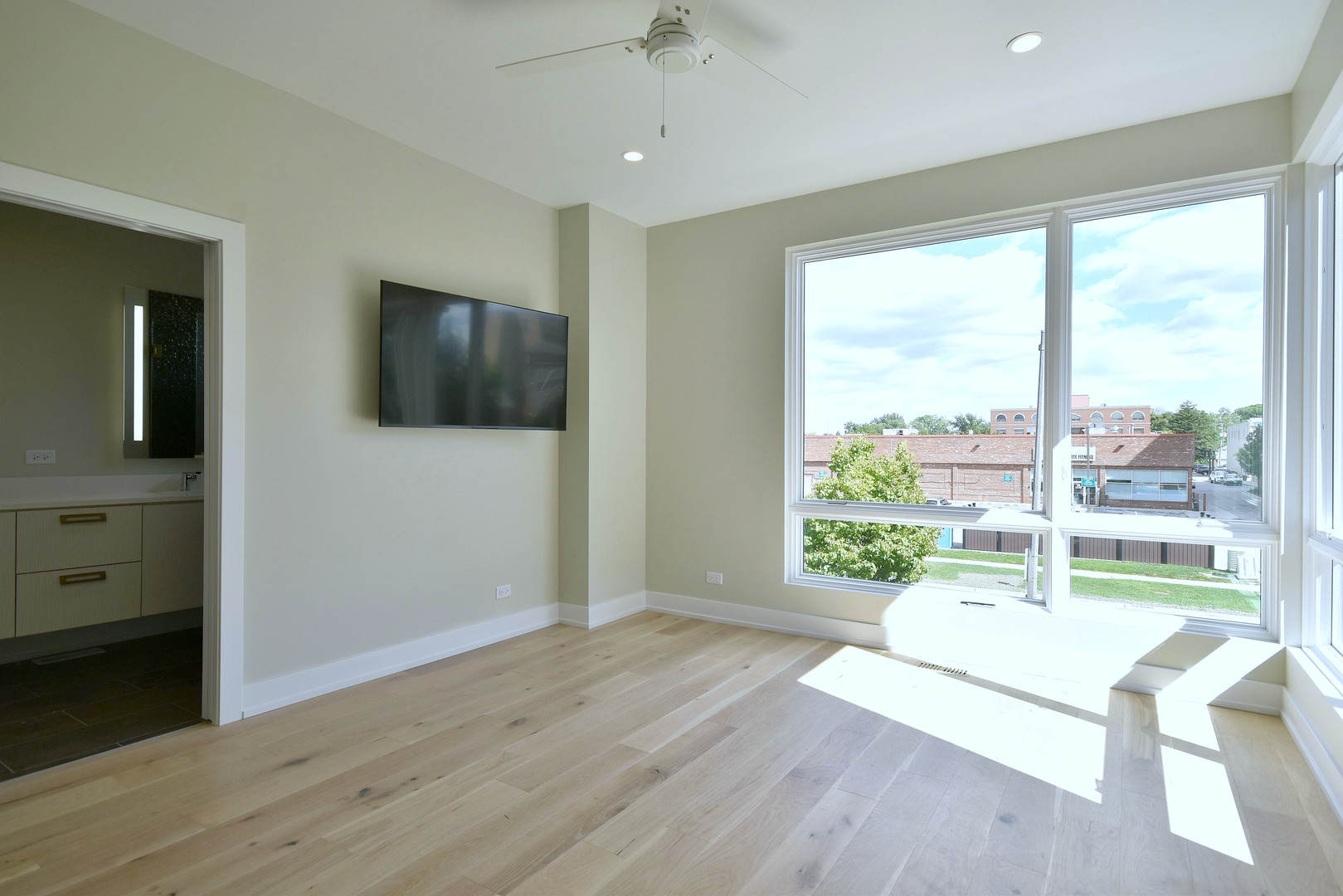 274 North Addison Avenue Elmhurst, IL 60126 - Photo 17 of 57 a living room with hardwood floor and a flat screen tv