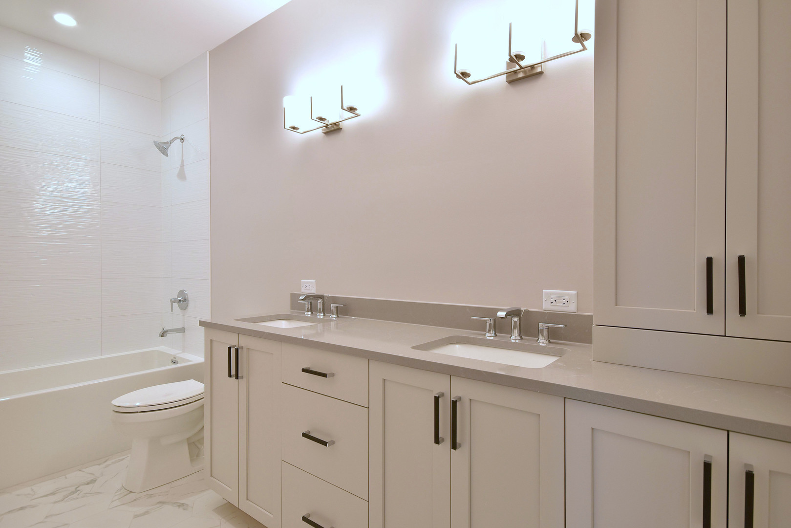 274 North Addison Avenue Elmhurst, IL 60126 - Photo 20 of 57 a bathroom with a granite countertop sink a toilet and a bathtub