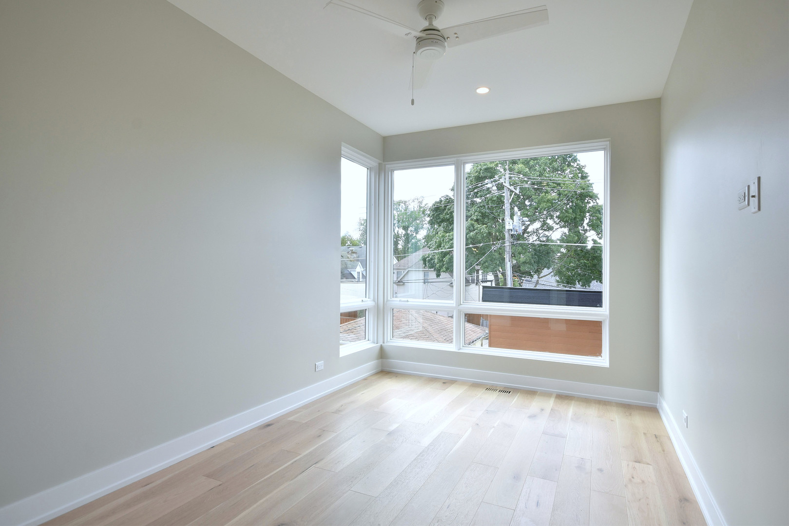 274 North Addison Avenue Elmhurst, IL 60126 - Photo 23 of 57 wooden floor in an empty room with a window