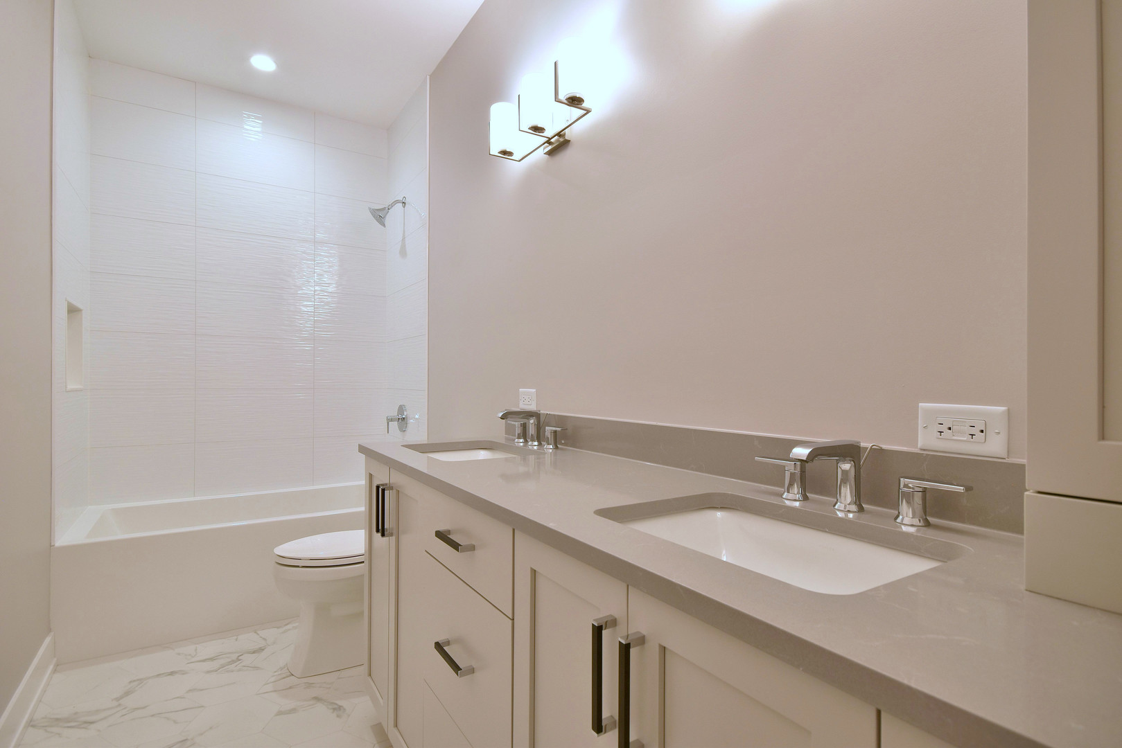 274 North Addison Avenue Elmhurst, IL 60126 - Photo 25 of 57 a bathroom with a granite countertop sink a toilet and a mirror