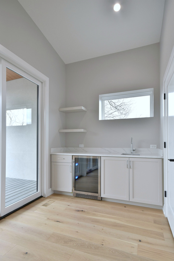 274 North Addison Avenue Elmhurst, IL 60126 - Photo 31 of 57 a view of a room with a cabinet and a fireplace