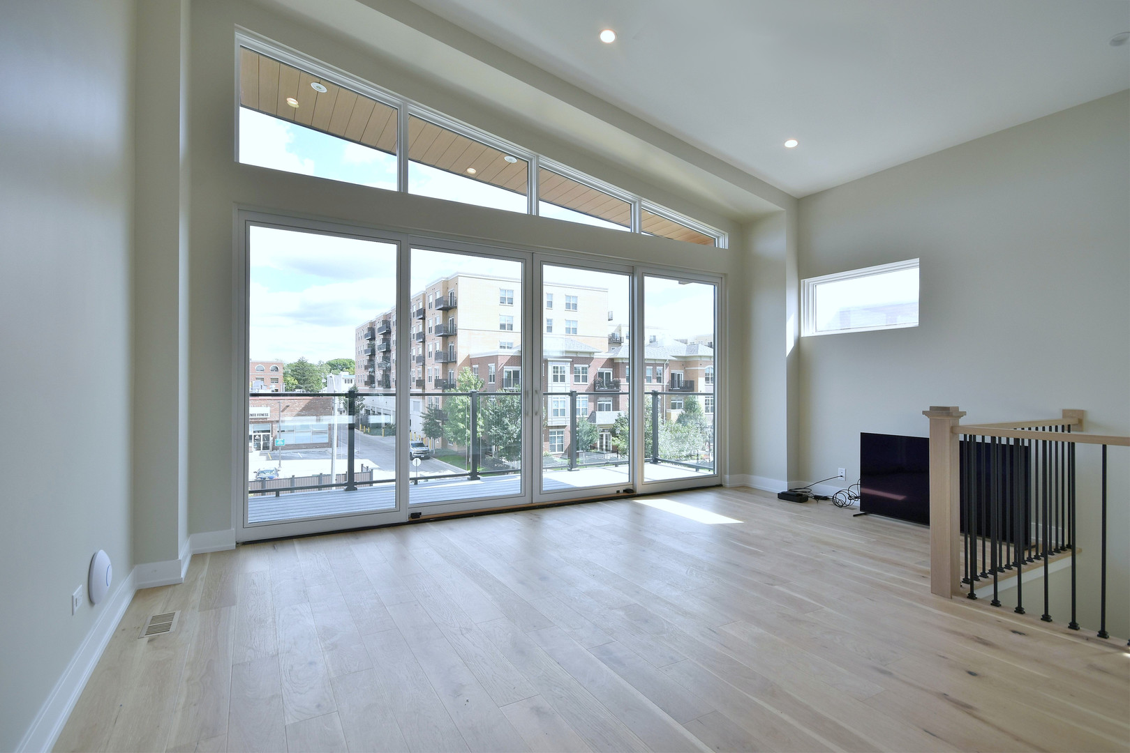 274 North Addison Avenue Elmhurst, IL 60126 - Photo 32 of 57 a view of an empty room with wooden floor and a window
