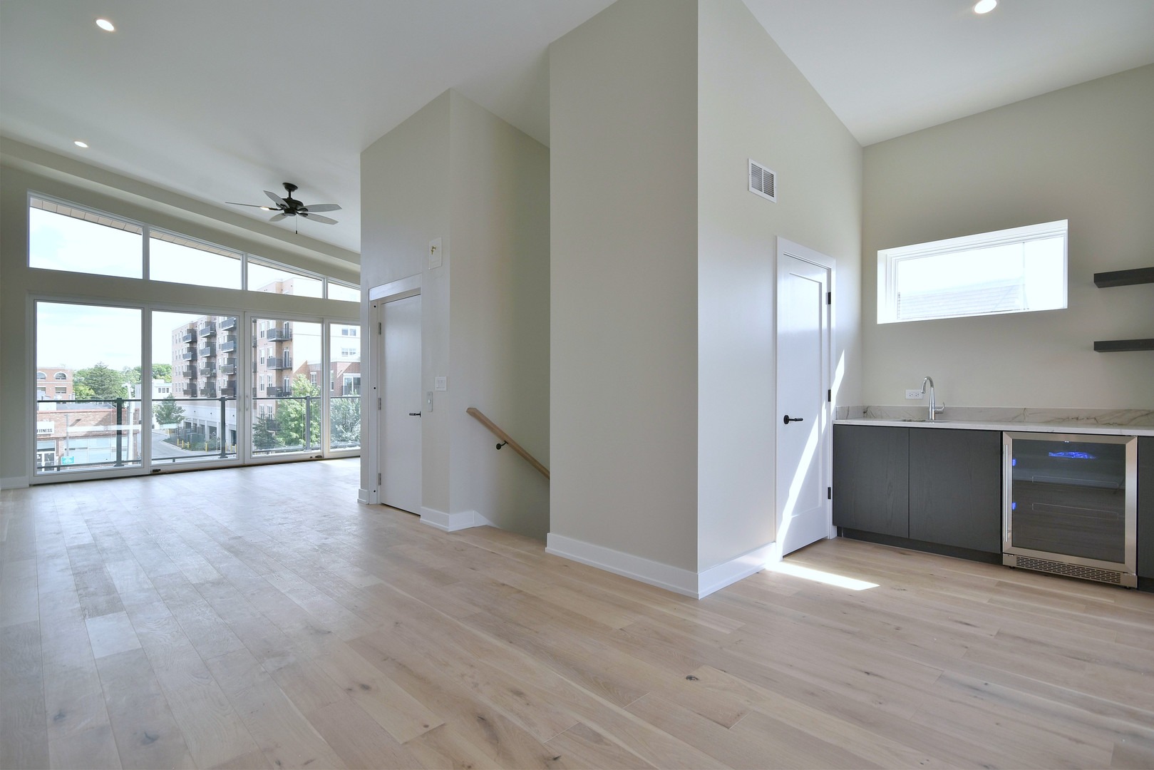 274 North Addison Avenue Elmhurst, IL 60126 - Photo 35 of 57 a view of an empty room with wooden floor and a window