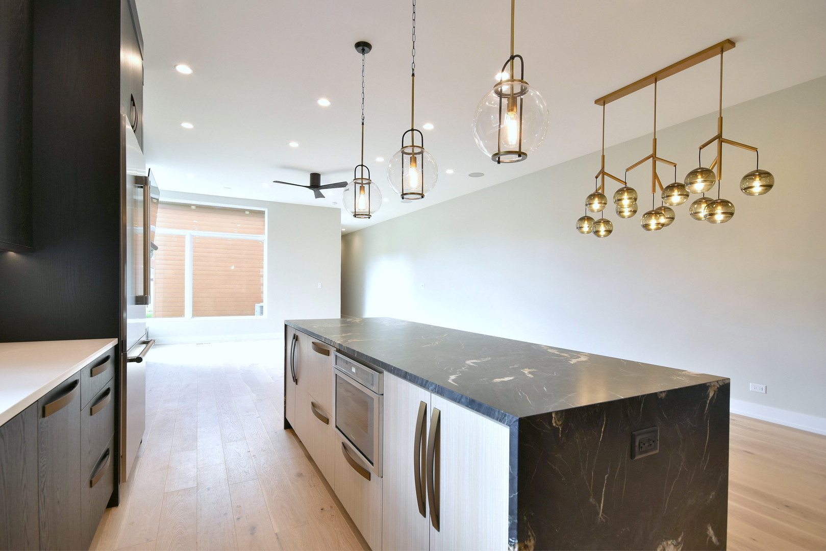 274 North Addison Avenue Elmhurst, IL 60126 - Photo 45 of 57 a kitchen with stainless steel appliances granite countertop a stove a sink and a refrigerator